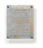 Decorative plaque with Hebrew text on a textured background